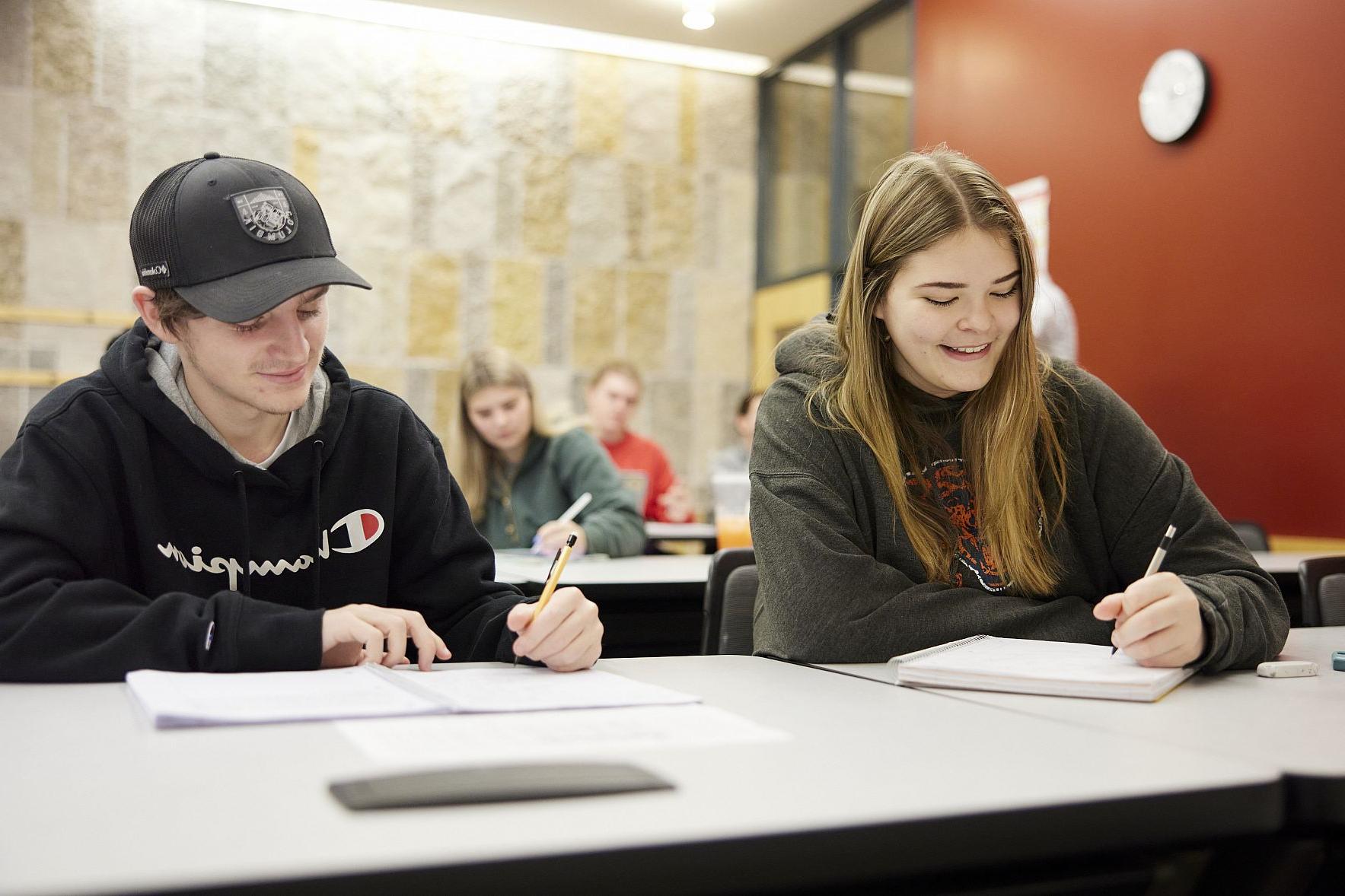 Carthage College economics majors in a classroom.